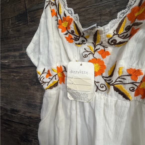 Elegant White Midi Dress with Orange Floral Accents - Picture 4 of 8